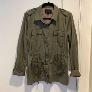 Army jacket with Aztec knitted back